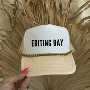 Editing Day trucker hat with gold chain trim, designed for photographers and creatives